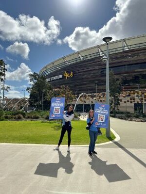 Photo of Volunteers for 2024 AFL Grand Final Experience Raffle