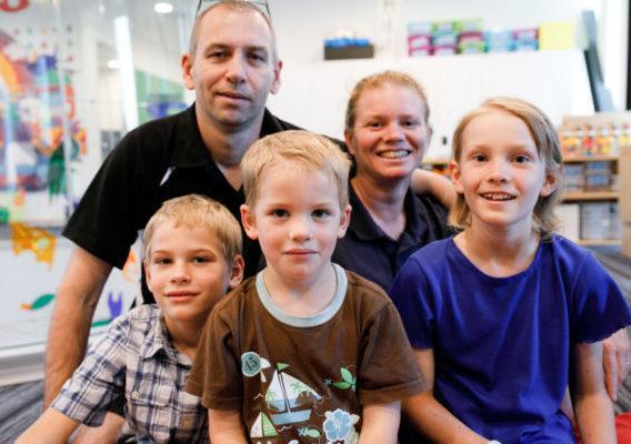 Photo of family in the Learning Centre at Ronald McDonald House Nedlands