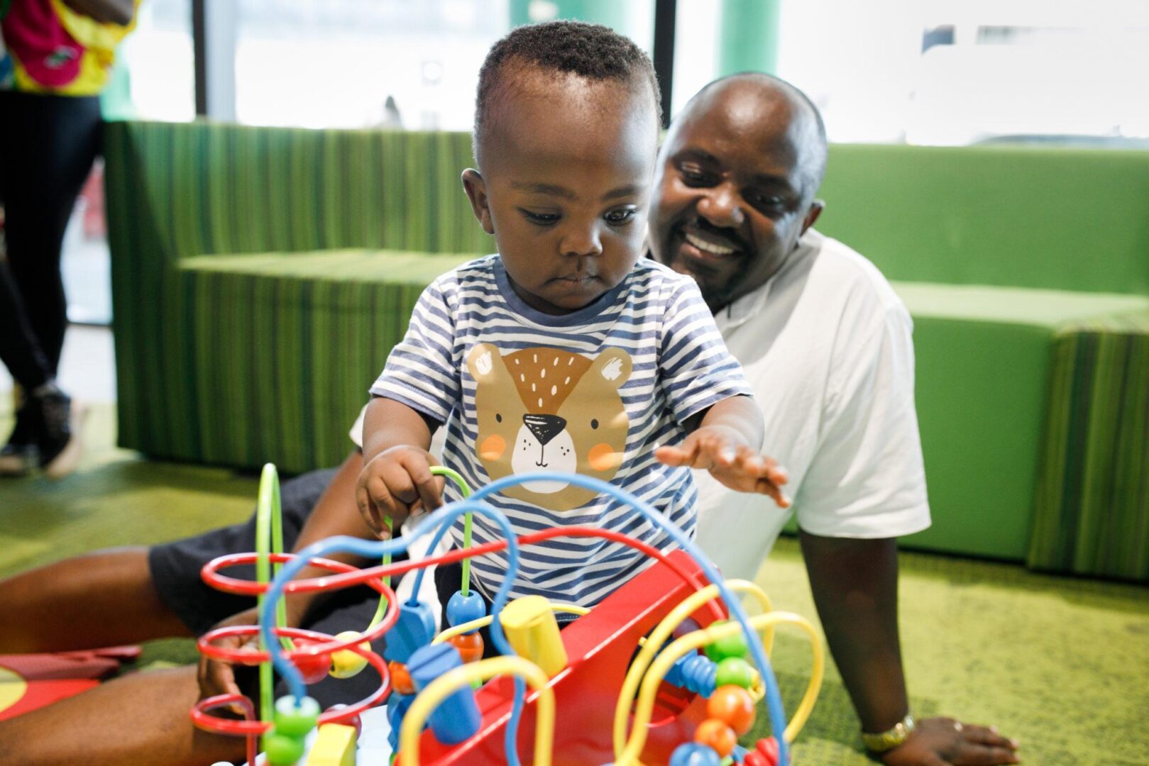Father and Son playing in the Ronald McDonald Family Room at Perth Children's Hospital